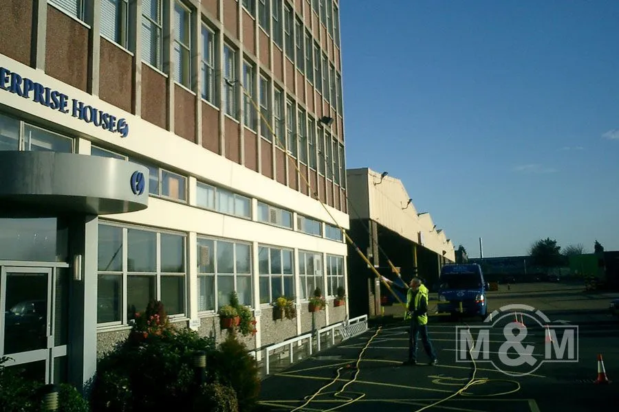 Cleaning windows of enterprise house